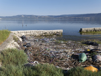 Huge quantities of tubular nets used for mussel farming and buoys employed in the fishing industry invade the sea and the coast around the l...