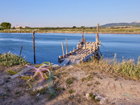 Huge quantities of tubular nets used for mussel farming and buoys employed in the fishing industry invade the sea and the coast around the l...