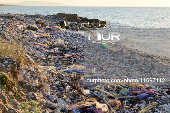 Huge quantities of tubular nets used for mussel farming and buoys employed in the fishing industry invade the sea and the coast around the l...