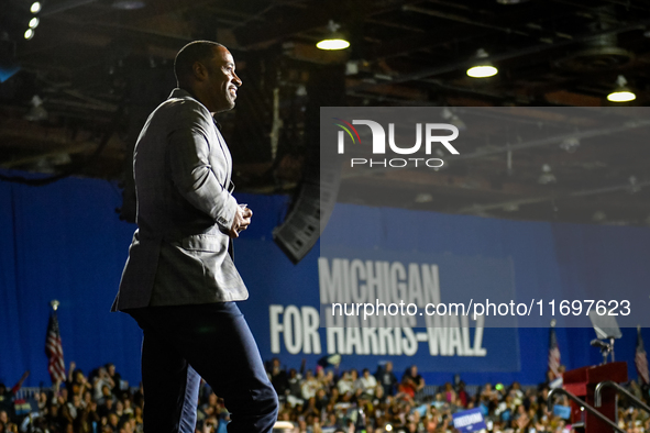 Former Detroit Lions wide receiver Calvin Johnson takes to the stage to speak during a presidential campaign rally for Kamala Harris at The...