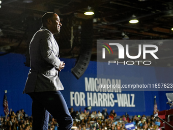 Former Detroit Lions wide receiver Calvin Johnson takes to the stage to speak during a presidential campaign rally for Kamala Harris at The...