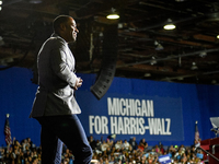 Former Detroit Lions wide receiver Calvin Johnson takes to the stage to speak during a presidential campaign rally for Kamala Harris at The...