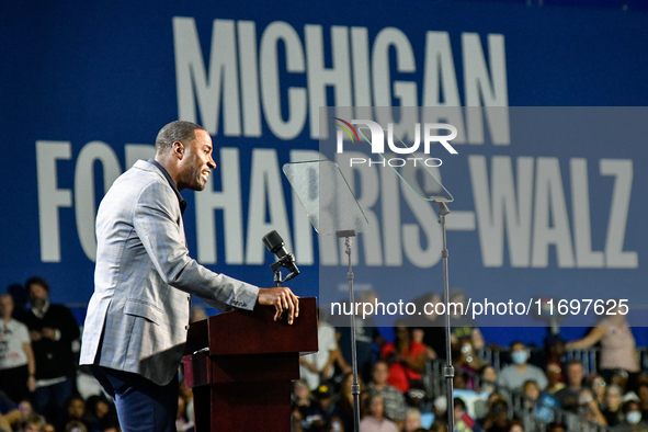 Former Detroit Lions wide receiver Calvin Johnson speaks during a presidential campaign rally for Kamala Harris at The Huntington Place in D...