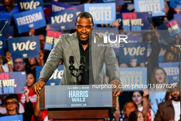 Former Detroit Lions wide receiver Calvin Johnson speaks during a presidential campaign rally for Kamala Harris at The Huntington Place in D...