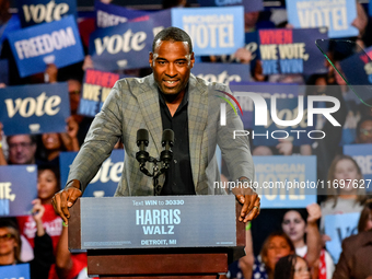 Former Detroit Lions wide receiver Calvin Johnson speaks during a presidential campaign rally for Kamala Harris at The Huntington Place in D...