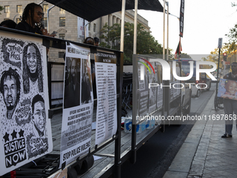 Dozens gather to protest police brutality at the Freedom Plaza in Washington, D.C., United States, on October 22, 2024. Protesters want an e...