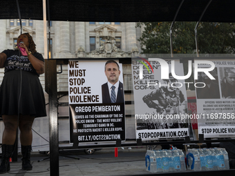 A person chants during the National Day of Protest to Stop Police Brutality in Washington, D.C., United States, on October 22, 2024. Protest...