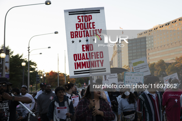 Dozens gather to protest police brutality in Washington, D.C., United States, on October 22, 2024, during the National Day of Protest to Sto...