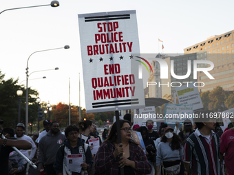 Dozens gather to protest police brutality in Washington, D.C., United States, on October 22, 2024, during the National Day of Protest to Sto...