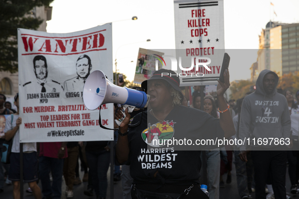 A person chants during the National Day of Protest to Stop Police Brutality in Washington, D.C., United States, on October 22, 2024. Protest...