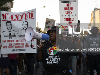 A person chants during the National Day of Protest to Stop Police Brutality in Washington, D.C., United States, on October 22, 2024. Protest...