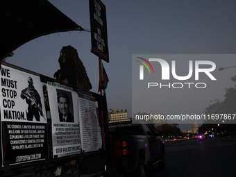 Dozens gather to protest police brutality in Washington, D.C., United States, on October 22, 2024, during the National Day of Protest to Sto...