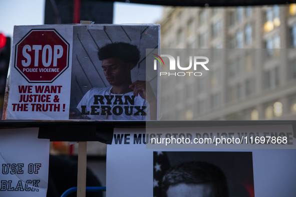 A sign is seen during the National Day of Protest to Stop Police Brutality in Washington, D.C., United States, on October 22, 2024. Proteste...