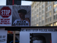 A sign is seen during the National Day of Protest to Stop Police Brutality in Washington, D.C., United States, on October 22, 2024. Proteste...