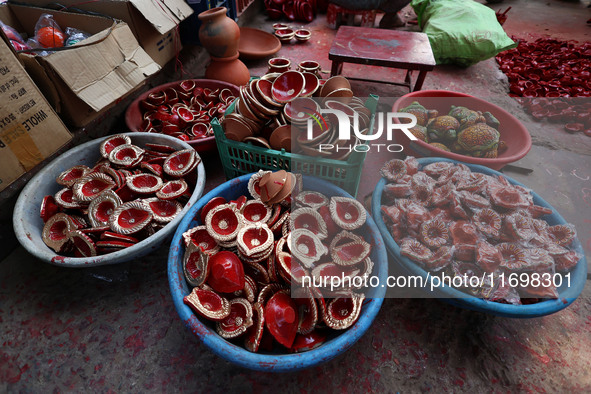 Colorful earthen lamps 'Diyas' are at a roadside shop ahead of the Diwali Festival in Jaipur, Rajasthan, India, on October 23, 2024. 