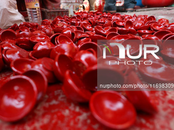 Colorful earthen lamps 'Diyas' are at a roadside shop ahead of the Diwali Festival in Jaipur, Rajasthan, India, on October 23, 2024. (