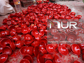 Colorful earthen lamps 'Diyas' are at a roadside shop ahead of the Diwali Festival in Jaipur, Rajasthan, India, on October 23, 2024. (