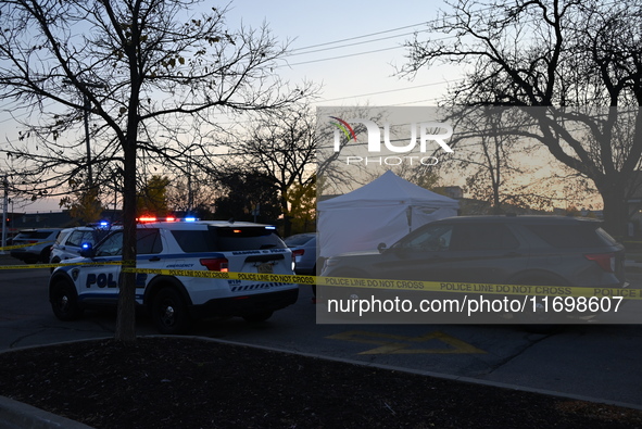 Madison police conduct a death investigation near Hy-Vee on Whitney Way in Madison, Wisconsin, United States, on October 22, 2024. The Madis...