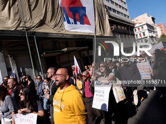 Teachers and educators hold a protest rally during a 24-hour strike called by the Teachers' Federation of Greece (DOE) and the Federation of...