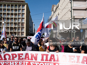 Teachers and educators hold a protest rally during a 24-hour strike called by the Teachers' Federation of Greece (DOE) and the Federation of...