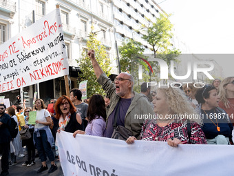 Teachers and educators hold a protest rally during a 24-hour strike called by the Teachers' Federation of Greece (DOE) and the Federation of...