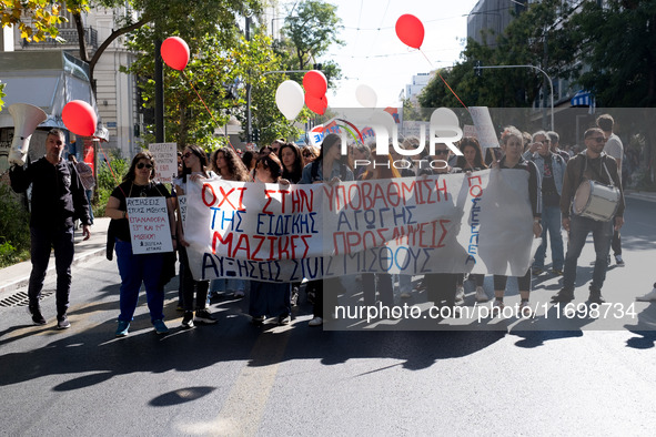 Teachers and educators hold a protest rally during a 24-hour strike called by the Teachers' Federation of Greece (DOE) and the Federation of...