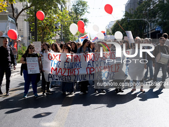 Teachers and educators hold a protest rally during a 24-hour strike called by the Teachers' Federation of Greece (DOE) and the Federation of...