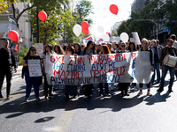 Teachers and educators hold a protest rally during a 24-hour strike called by the Teachers' Federation of Greece (DOE) and the Federation of...