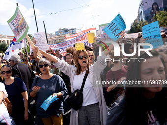 Teachers and educators hold a protest rally during a 24-hour strike called by the Teachers' Federation of Greece (DOE) and the Federation of...