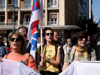 Teachers and educators hold a protest rally during a 24-hour strike called by the Teachers' Federation of Greece (DOE) and the Federation of...