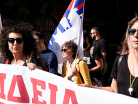 Teachers and educators hold a protest rally during a 24-hour strike called by the Teachers' Federation of Greece (DOE) and the Federation of...