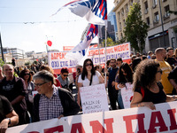 Teachers and educators hold a protest rally during a 24-hour strike called by the Teachers' Federation of Greece (DOE) and the Federation of...