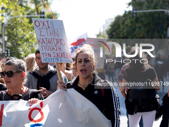 Teachers and educators hold a protest rally during a 24-hour strike called by the Teachers' Federation of Greece (DOE) and the Federation of...