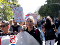 Teachers and educators hold a protest rally during a 24-hour strike called by the Teachers' Federation of Greece (DOE) and the Federation of...