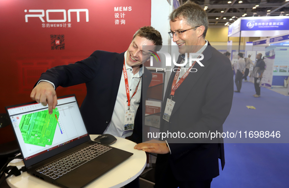 Visitors attend the 14th China International Nanotechnology Industry Expo in Suzhou, China, on October 23, 2024. 