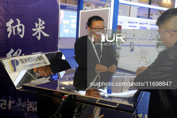 Visitors attend the 14th China International Nanotechnology Industry Expo in Suzhou, China, on October 23, 2024. 