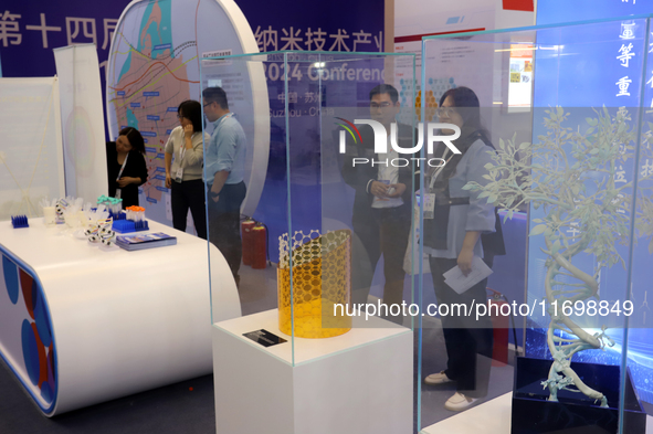 Visitors attend the 14th China International Nanotechnology Industry Expo in Suzhou, China, on October 23, 2024. 