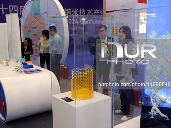 Visitors attend the 14th China International Nanotechnology Industry Expo in Suzhou, China, on October 23, 2024. (