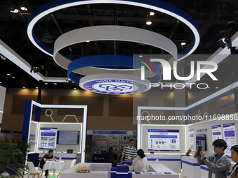 Visitors attend the 14th China International Nanotechnology Industry Expo in Suzhou, China, on October 23, 2024. (