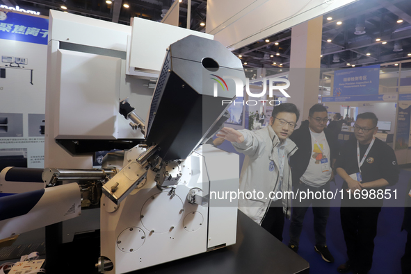 Visitors attend the 14th China International Nanotechnology Industry Expo in Suzhou, China, on October 23, 2024. 