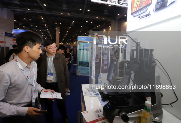 Visitors attend the 14th China International Nanotechnology Industry Expo in Suzhou, China, on October 23, 2024. 