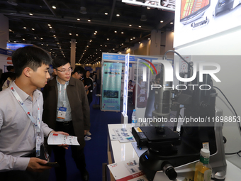 Visitors attend the 14th China International Nanotechnology Industry Expo in Suzhou, China, on October 23, 2024. (