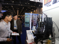 Visitors attend the 14th China International Nanotechnology Industry Expo in Suzhou, China, on October 23, 2024. (