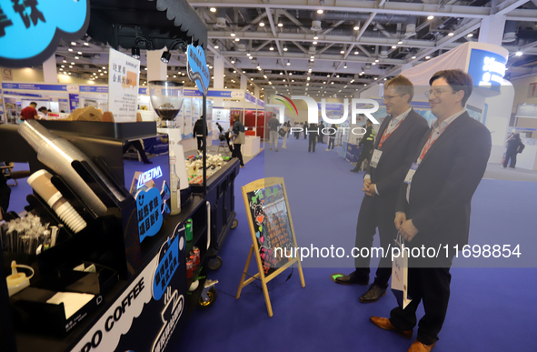 Visitors attend the 14th China International Nanotechnology Industry Expo in Suzhou, China, on October 23, 2024. 