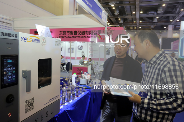 Visitors attend the 14th China International Nanotechnology Industry Expo in Suzhou, China, on October 23, 2024. 