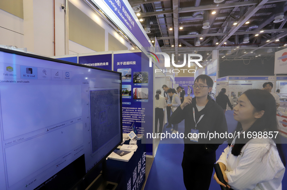 Visitors attend the 14th China International Nanotechnology Industry Expo in Suzhou, China, on October 23, 2024. 