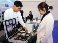 Visitors attend the 14th China International Nanotechnology Industry Expo in Suzhou, China, on October 23, 2024. (