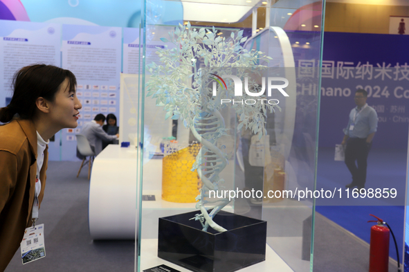 Visitors attend the 14th China International Nanotechnology Industry Expo in Suzhou, China, on October 23, 2024. 