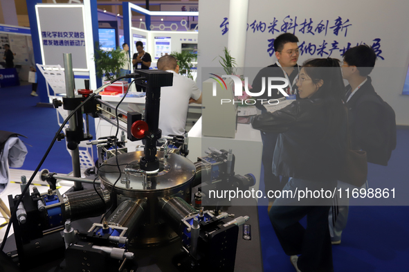 Visitors attend the 14th China International Nanotechnology Industry Expo in Suzhou, China, on October 23, 2024. 