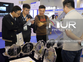 Visitors attend the 14th China International Nanotechnology Industry Expo in Suzhou, China, on October 23, 2024. (